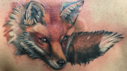 Explore leg tattoo ideas, creative tattoo ideas in Chapel Hill, available at Golden Falcon Tattoo and Piercing