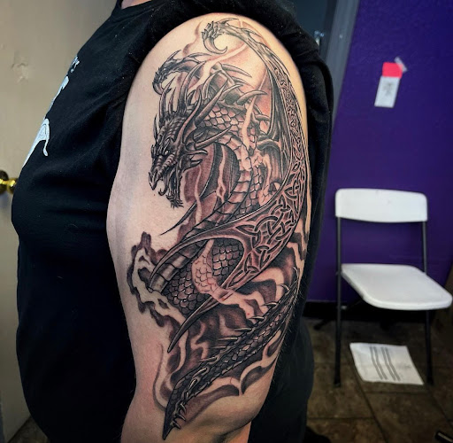 Explore elbow tattoo ideas male, creative tattoo ideas in Fort Wayne, available at Grade A Tattoos and Body Piercing