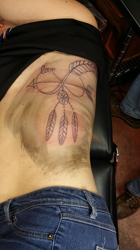 Explore wildflower tattoo ideas, creative tattoo ideas in Sedona, available at Physical Graffiti Tattoo