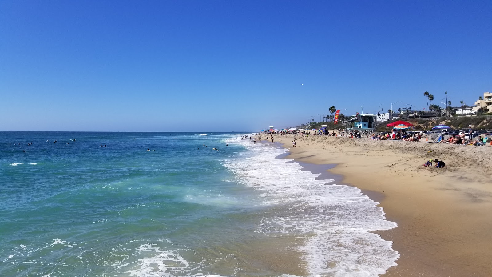 Photo of Tamarack Surf beach with turquoise pure water surface