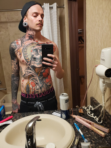 Explore ideas for stomach tattoos, creative tattoo ideas in Las Vegas, available at Bad Apple Tattoo