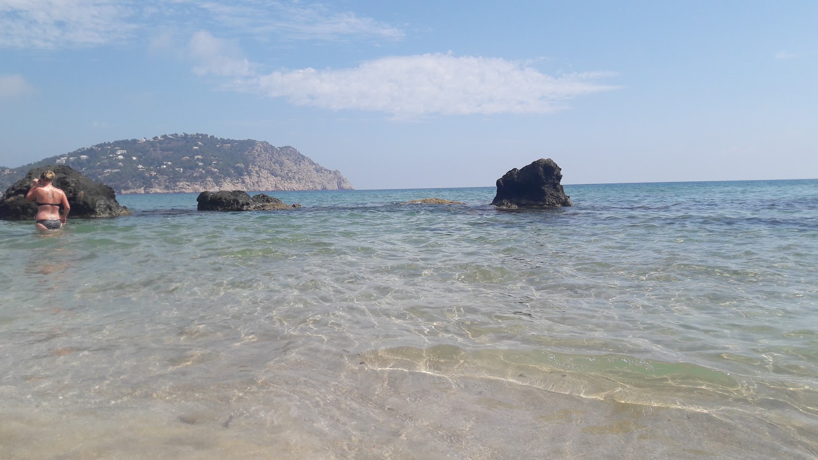 Photo of Platja de s'Aigua Blanca and its beautiful scenery