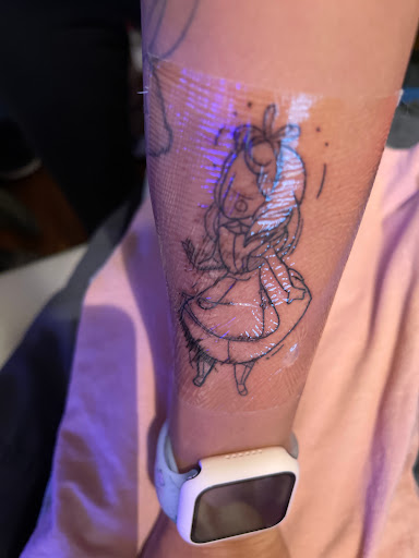 Explore pansy tattoo ideas, creative tattoo ideas in Waxahachie, available at ExclusivE Tattoo and Barber