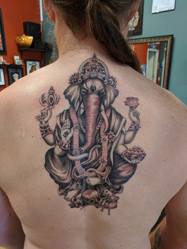 Explore adopted tattoo ideas, creative tattoo ideas in Asheville, available at Magic Dagger Tattoo
