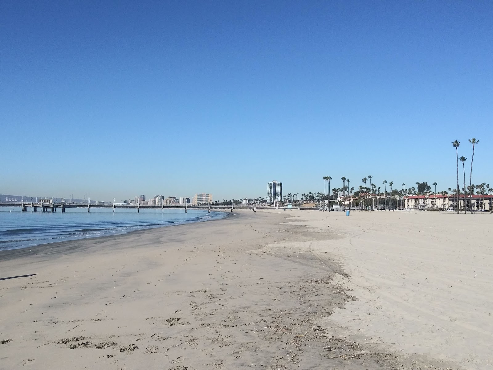 Foto von Belmont Beach mit beiger sand Oberfläche