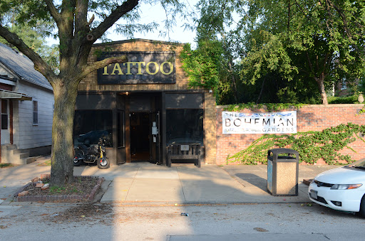 Explore bird cage tattoo ideas, creative tattoo ideas in Omaha, available at Collective Hive Tattoo