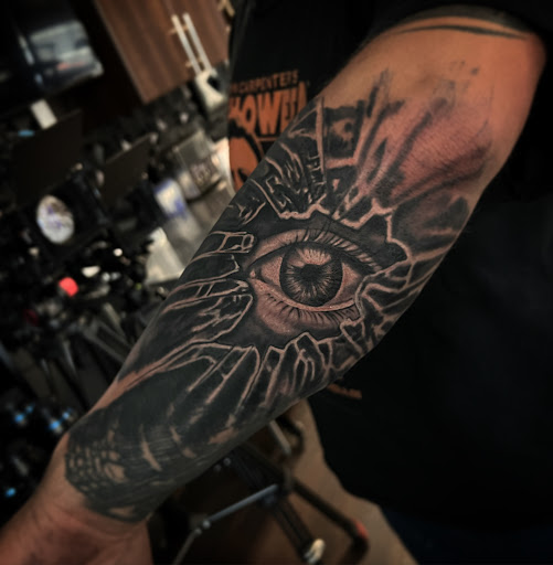 Explore chest tattoo filler ideas, creative tattoo ideas in Medina, available at Greasers Ink