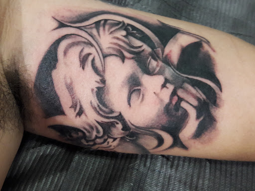 Explore dolphin tattoo ideas, creative tattoo ideas in Fort Lauderdale, available at Rock And Roll Tattoo, Piercing, Laser removal