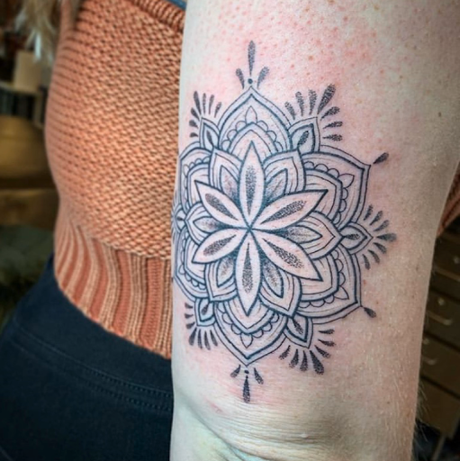 Explore tattoo ideas for a submissive, creative tattoo ideas in Atlanta, available at Big Cat Tattoo