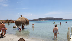 Foto von Cocos Club Strand und die siedlung