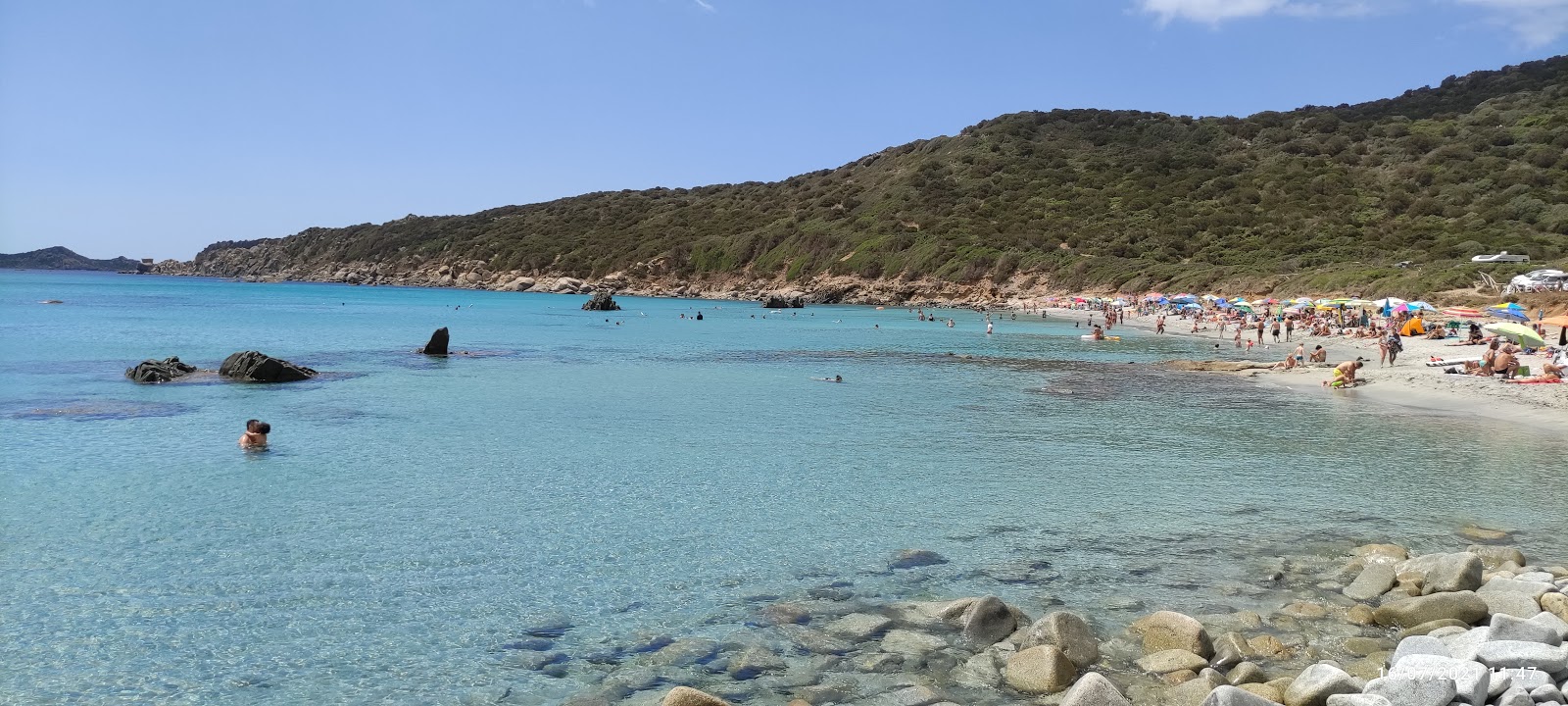 Foto von Capo Carbonara Beach mit beiger sand Oberfläche