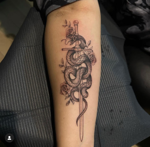 Explore rottweiler tattoo ideas, creative tattoo ideas in Fort Wayne, available at Grade A Tattoos and Body Piercing