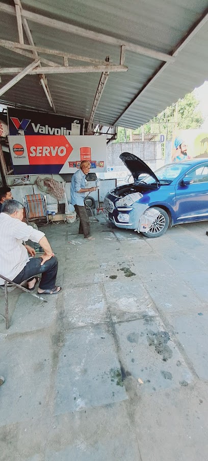 MM Garage All Car Reparing Danting & Painting Maruti Motor Garage (Best Car Garage in Vadodara) 45+years Experience Experts