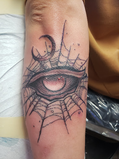 Explore sloth tattoo ideas, creative tattoo ideas in Elko, available at Tom Custom Tattoos and Body Piercing Studio