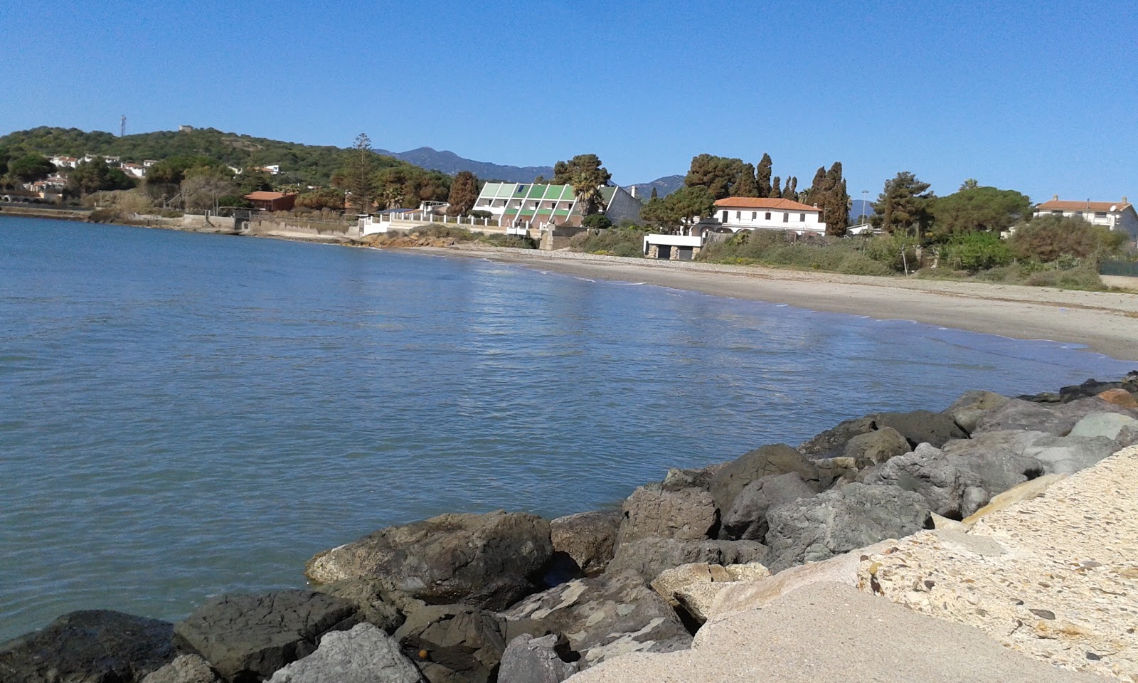 Foto von Spiaggia di Perd'e Sali mit beiger sand Oberfläche