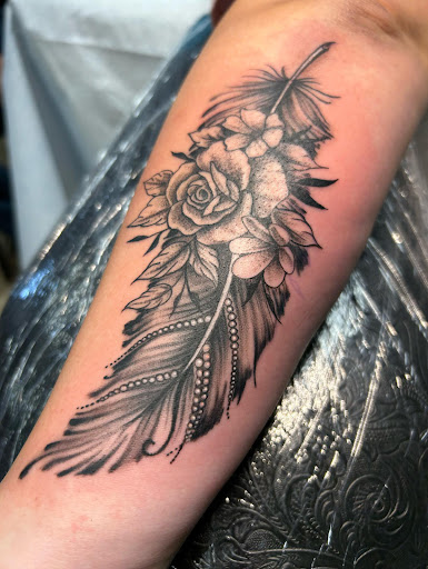 Explore manatee tattoo ideas, creative tattoo ideas in Houston, available at 333 Tattoo Studio HTX