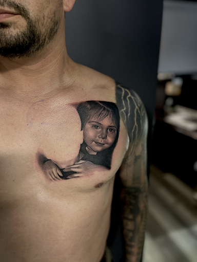 Explore titanic tattoo ideas, creative tattoo ideas in Kansas City, available at Enova Ink