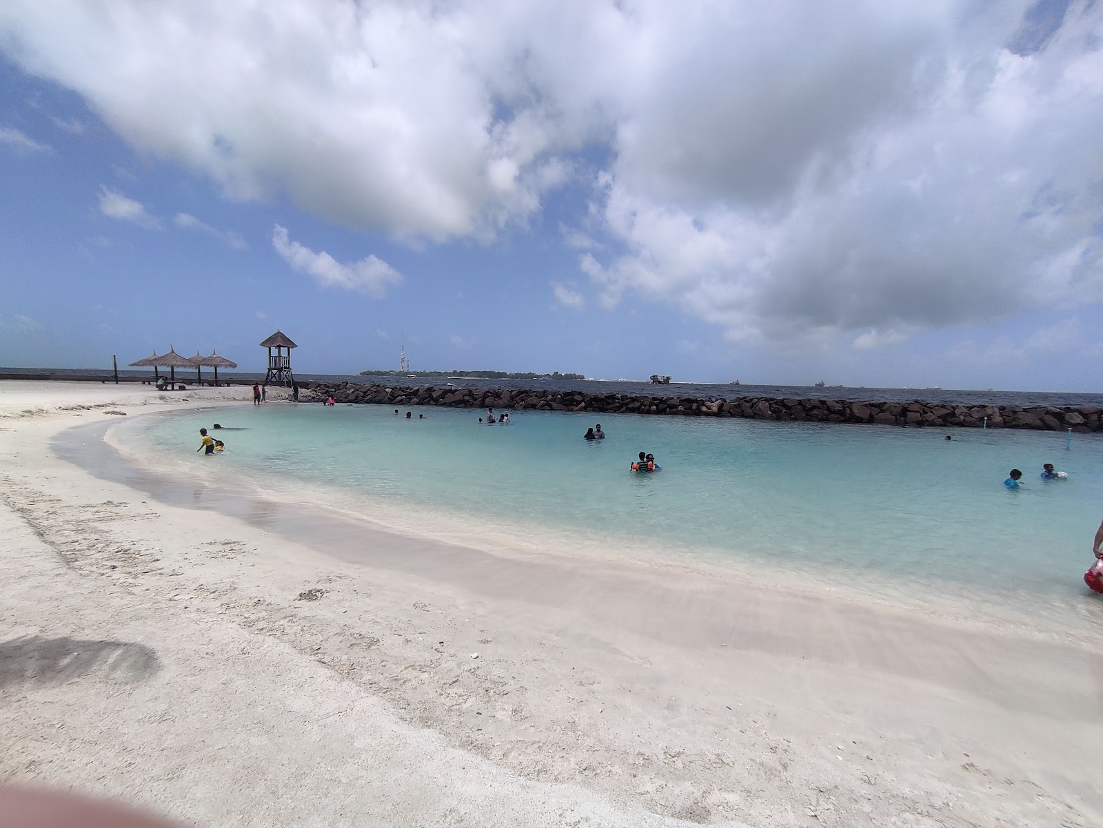 Photo of Rasfannu Artificial Beach and the settlement