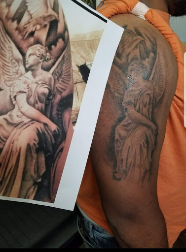 Explore st michael the archangel tattoos ideas, creative tattoo ideas in Texarkana, available at Illusions Mafia Ink Tattoo Studio