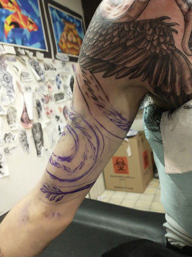 Explore tattoo ideas representing strength, creative tattoo ideas in Carbondale, available at MsCandyTattoo