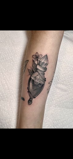 Find feminine skull tattoo ideas for your next unique tattoo in Goose Creek at Red Kirin Tattoo