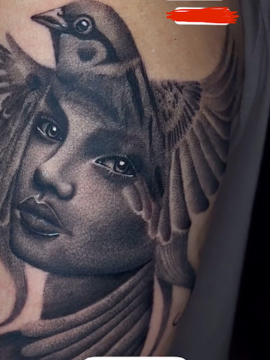 Explore pectoral tattoo ideas, creative tattoo ideas in Davenport, available at Fine Ink Studios Tattoos
