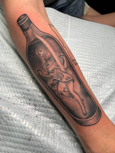 Explore side of neck tattoo ideas, creative tattoo ideas in Cape Coral, available at UNRIVALED INK