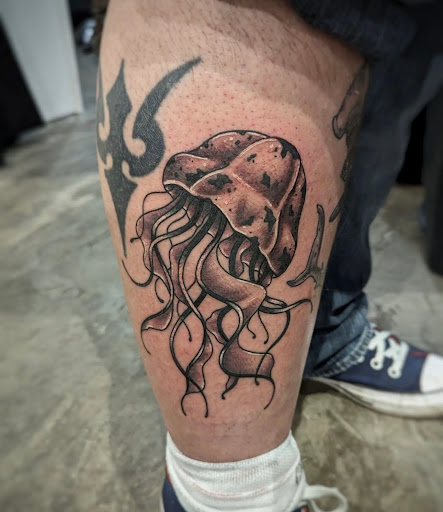 Explore small patchwork tattoo ideas, creative tattoo ideas in Dothan, available at Dinosaur Tattoo Company