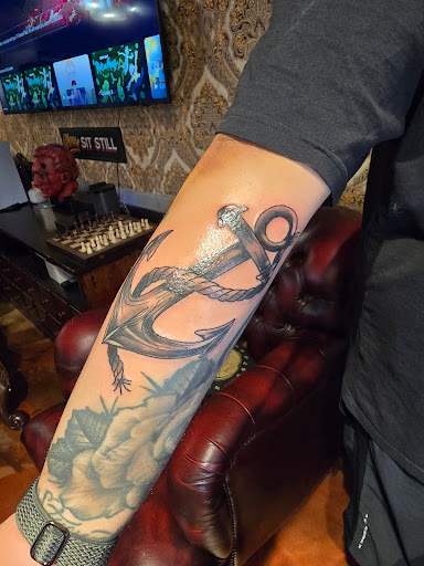 Explore mens tattoo forearm ideas, creative tattoo ideas in Winter Park, available at Golden Tarot Ink Club