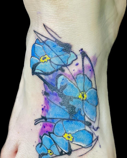 Explore bass tattoos ideas, creative tattoo ideas in Daytona Beach, available at Studio 21 Tattoo & Piercings Daytona Beach