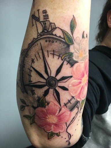 Explore banger tattoo ideas, creative tattoo ideas in Greenfield, available at Tattoos In Time Studio