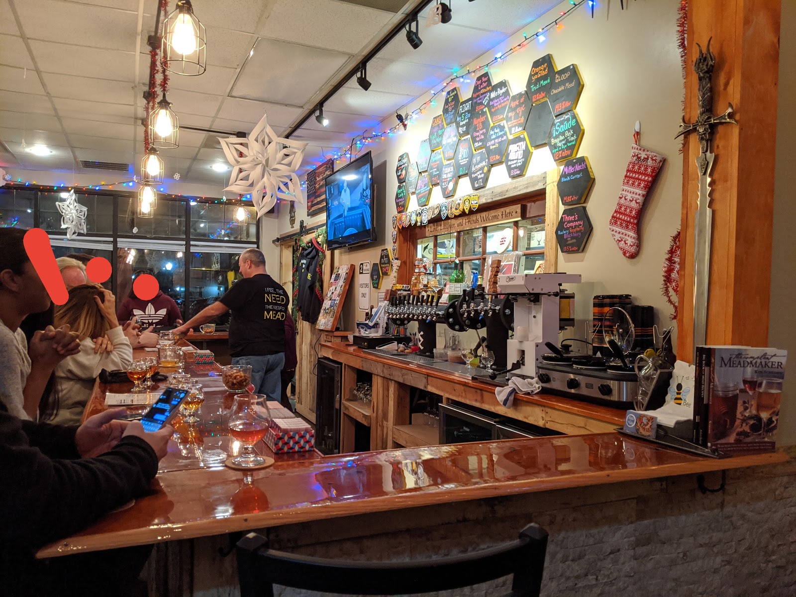Beer taps lined up on a bar