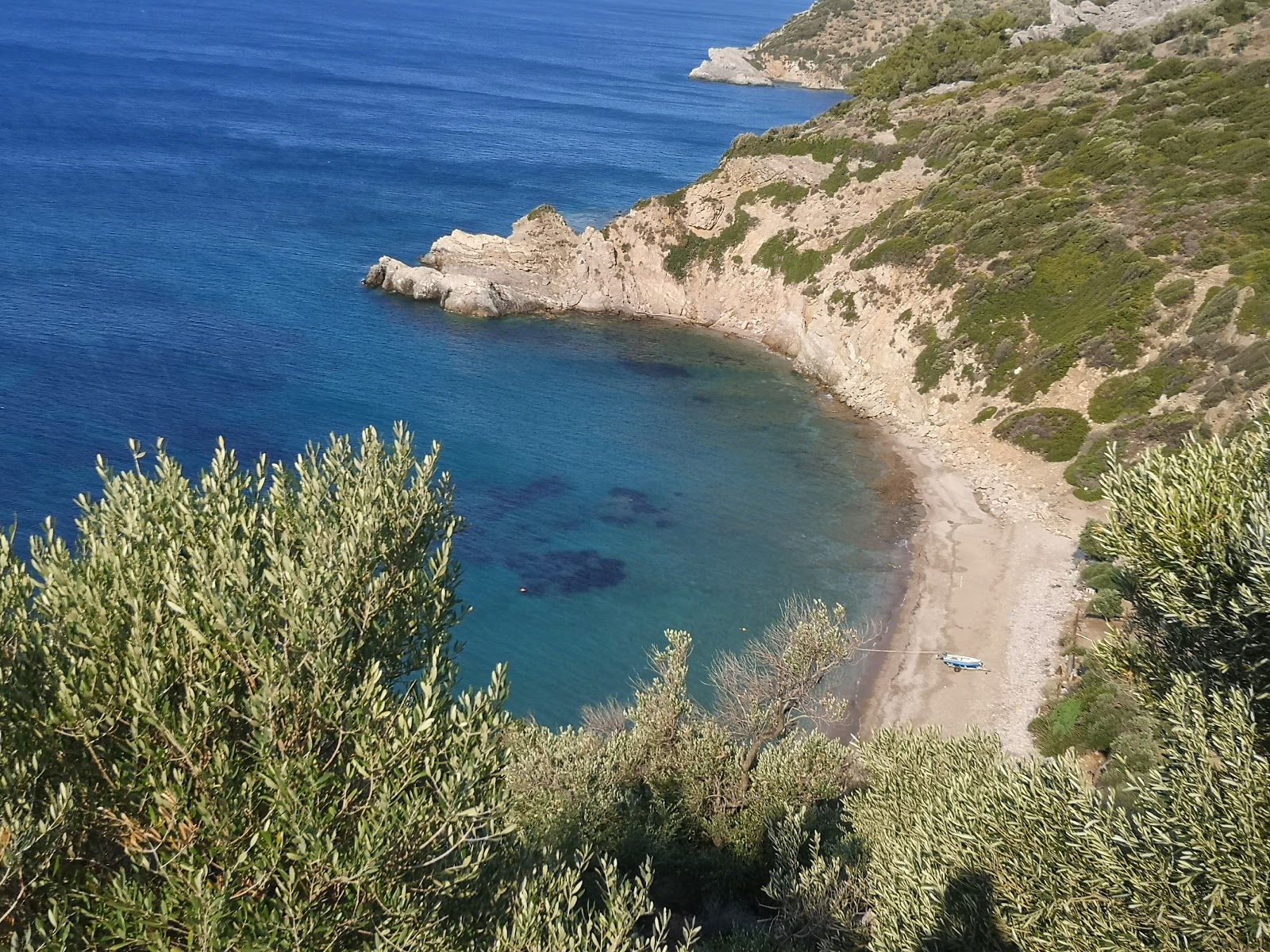 Foto de Fara beach III com areia bege e seixos superfície
