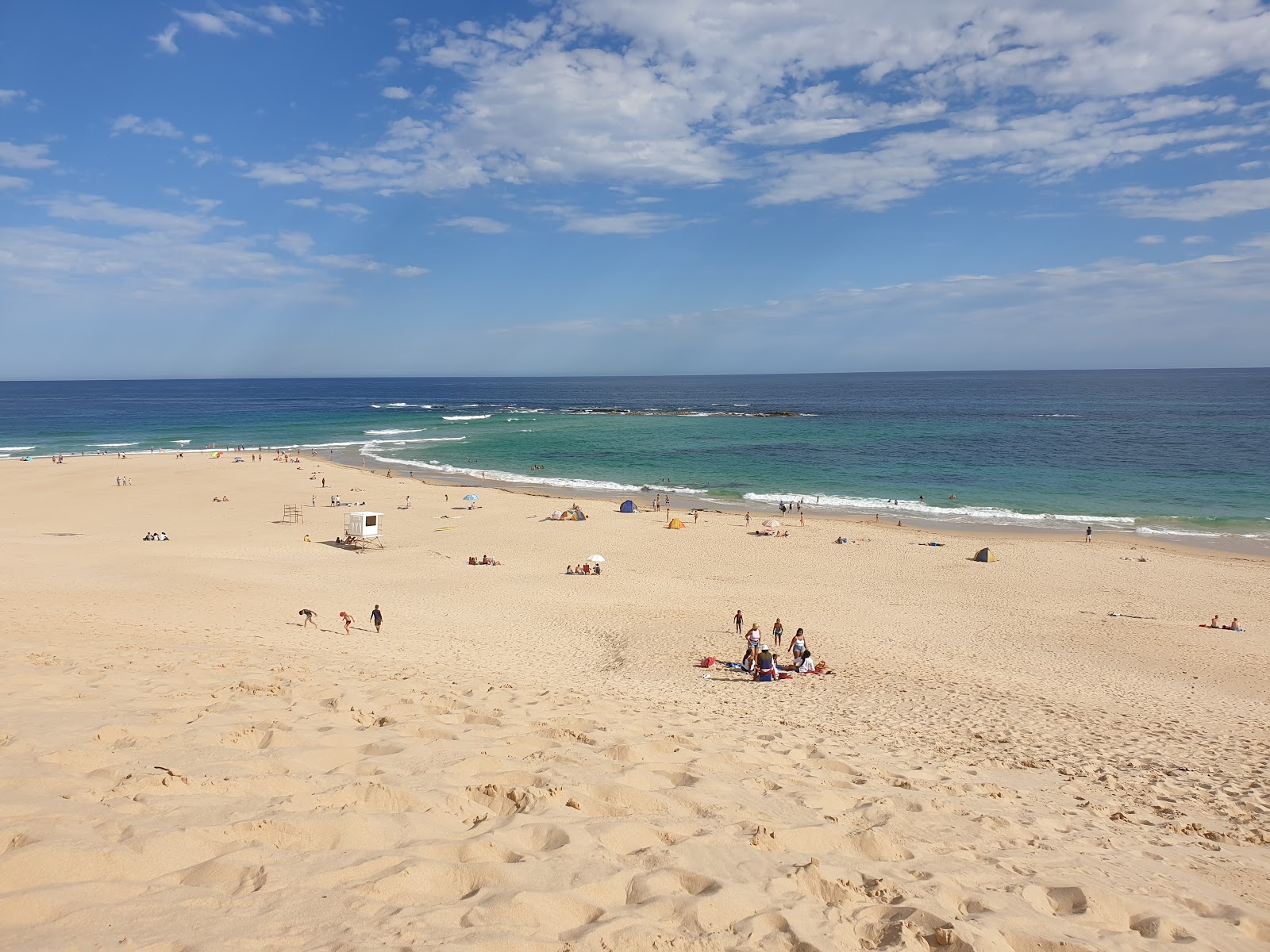 Foto van Sardinia Bay beach met beige zand oppervlakte