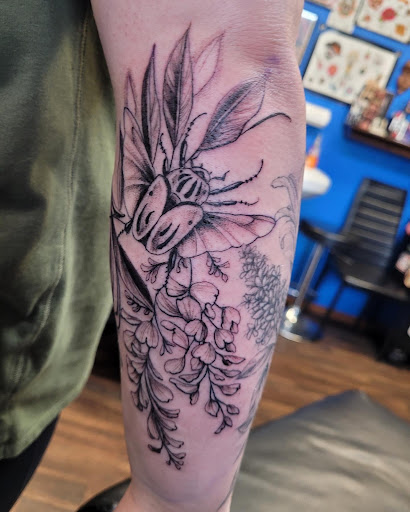 Explore totem pole tattoo ideas, creative tattoo ideas in Covington, available at Covington Tattoo Emporium