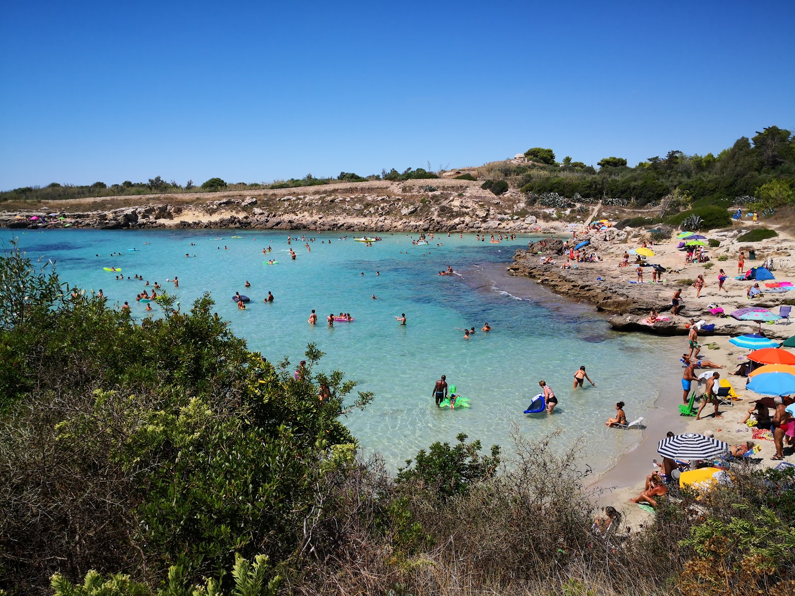 Foto van Spiaggia di Porto Pirrone met helder zand oppervlakte