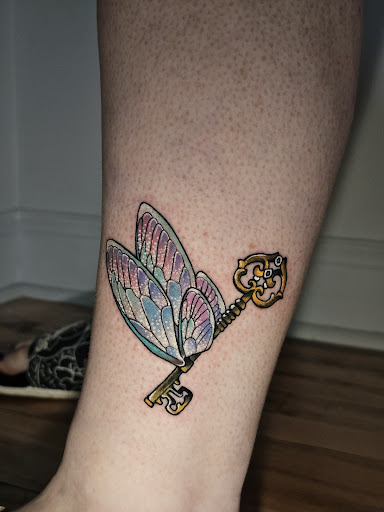 Explore violin tattoo ideas, creative tattoo ideas in Kansas City, available at Golden Stag Tattoo and Gallery