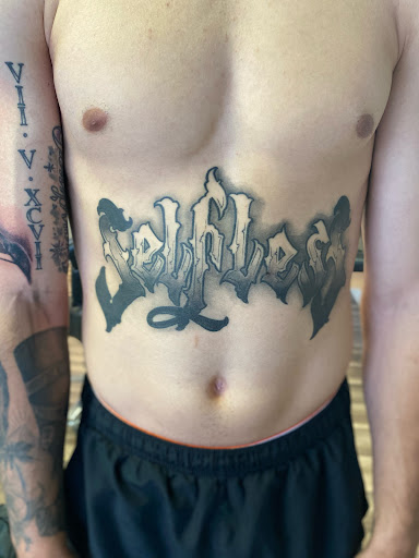 Explore fullback tattoo ideas, creative tattoo ideas in Lexington, available at The Tattoo Lounge