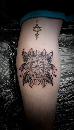 Explore dark skin male black skin tattoo ideas, creative tattoo ideas in Butte, available at Aphotic Tattoo Studio & Artistry