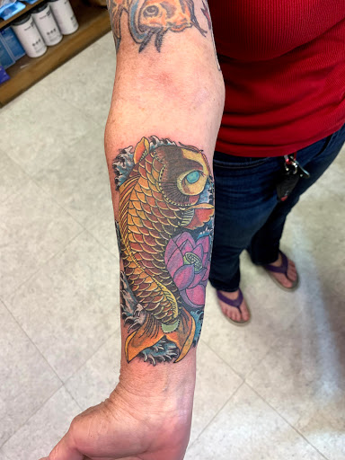 Explore lower stomach tattoo ideas, creative tattoo ideas in Hudson Falls, available at ALTERED ADDICTION TATTOOS