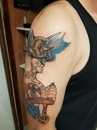 Explore tattoo ideas for a name cover up, creative tattoo ideas in Cumberland, available at Queen City Ink