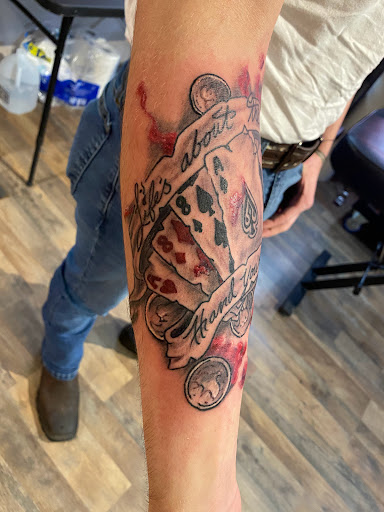 Explore tattoo sleeve ideas lion, creative tattoo ideas in Pikeville, available at The Carbon Canary Tattoo Studio