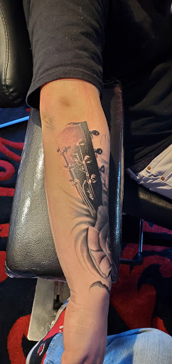 Explore family crest tattoo ideas, creative tattoo ideas in Kalispell, available at Swindler Ink