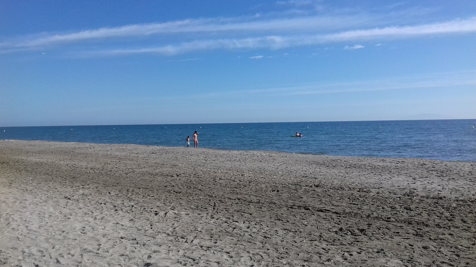 Foto av Plage de San Pellegrino med lång rak strand