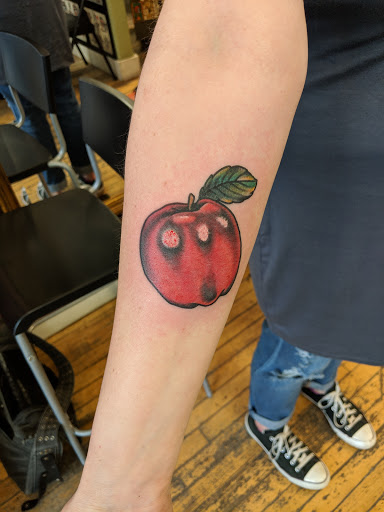 Explore rose name tattoo ideas, creative tattoo ideas in Lansing, available at Fish Ladder Tattoo Company