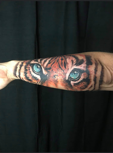 Explore meaningful elegant spine tattoo ideas, creative tattoo ideas in Sunbury, available at Absinthe Tattoo