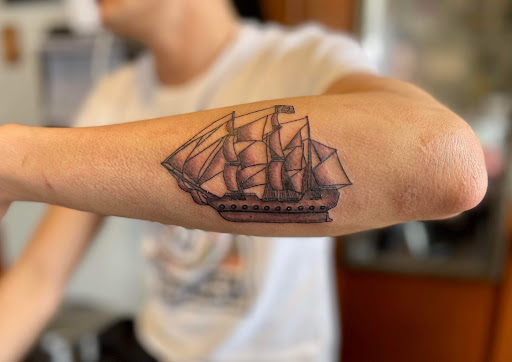 Explore stomach tattoo ideas for women, creative tattoo ideas in Warrensburg, available at Altered Visions Tattoo Studio