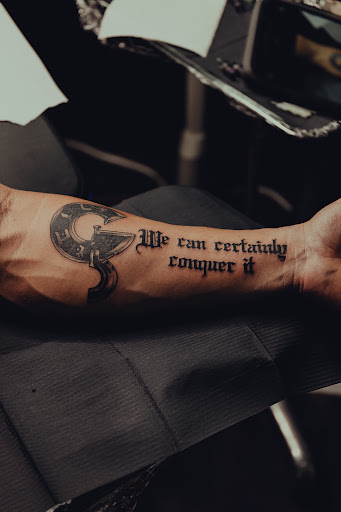 Explore photographer tattoo ideas, creative tattoo ideas in Ogden, available at Gilded Lotus Tattoo and Piercing