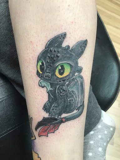 Explore tattoo ideas paw print, creative tattoo ideas in Greenville, available at Shifting Tides Tattoo