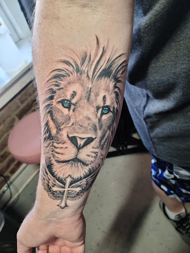 Explore writing tattoo ideas, creative tattoo ideas in Dunn, available at Heart and Hammer Tattoo Co.